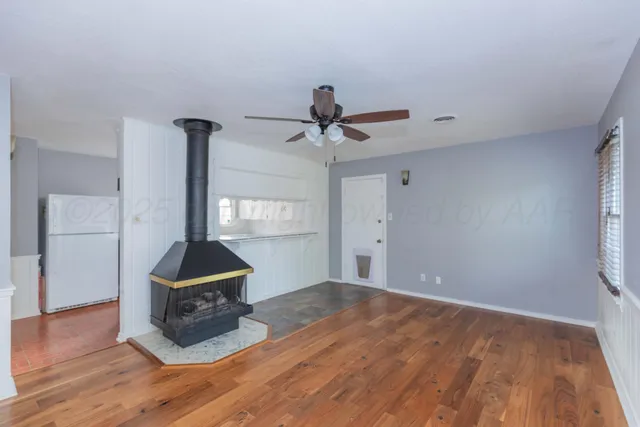 a view of an empty room and window