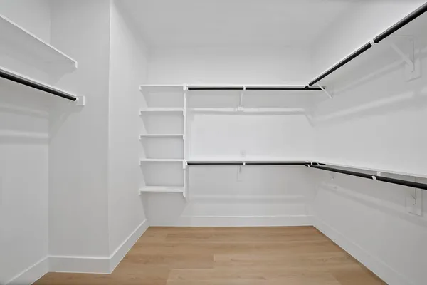a view of an empty walk in closet