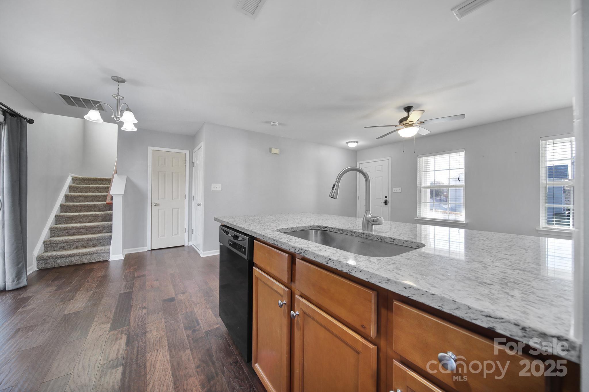 2001 Roscommon Drive Clover, SC 29710 - Photo 11 of 37 a kitchen with a sink and chandelier
