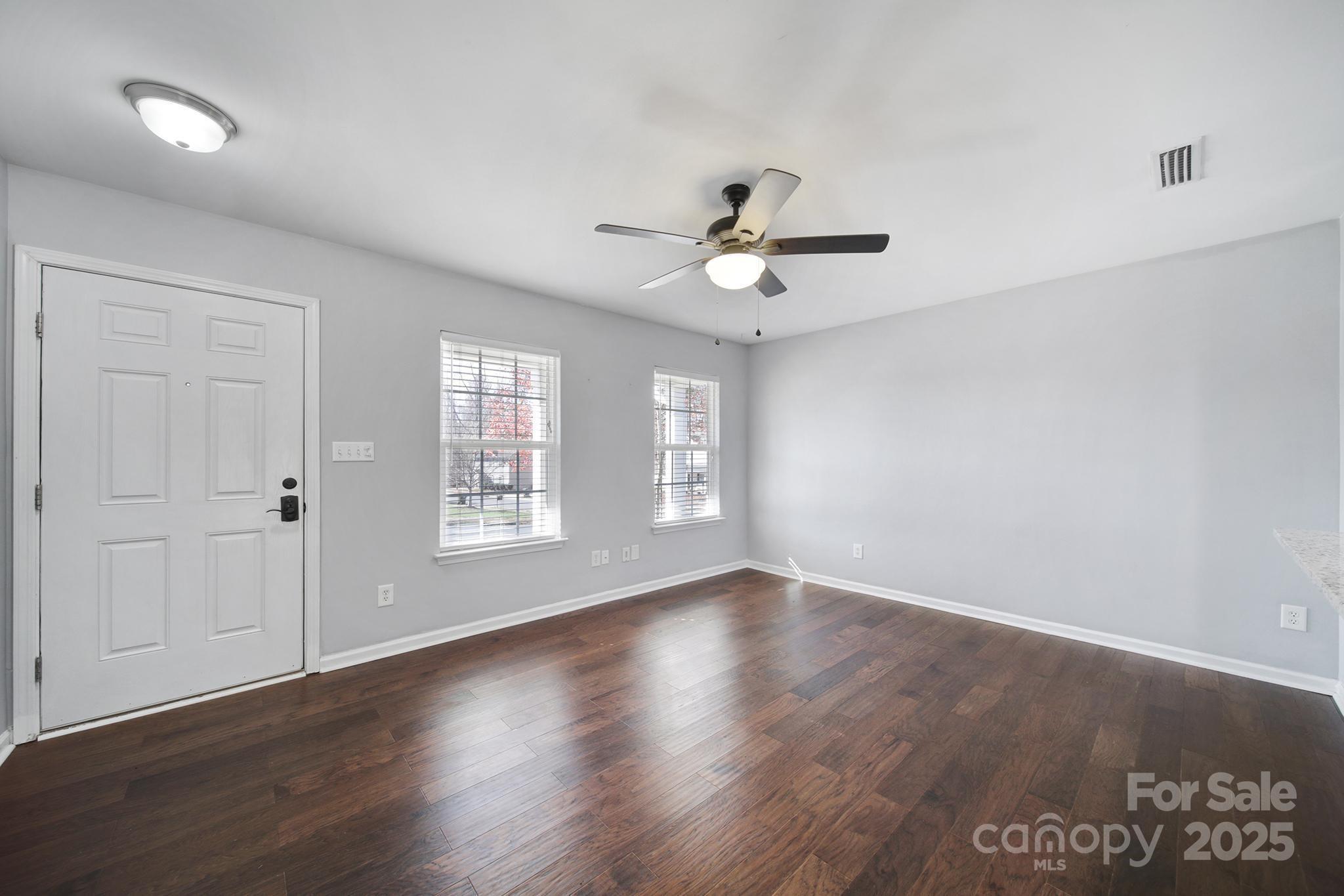 2001 Roscommon Drive Clover, SC 29710 - Photo 6 of 37 a view of an empty room with a window and wooden floor