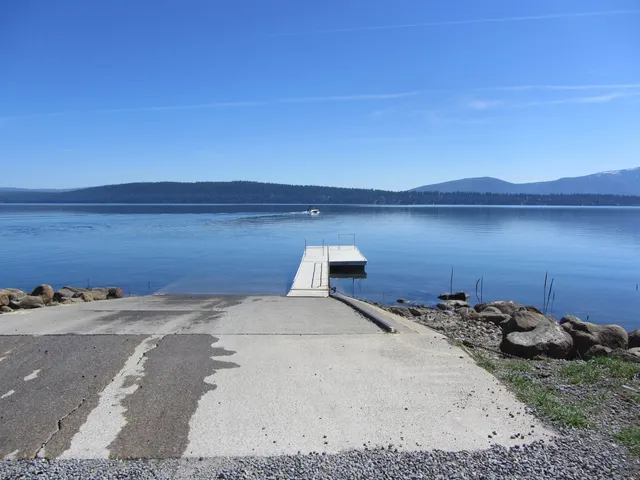 a view of bed and small yard