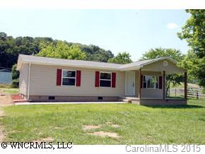 4438 Old River Road Waynesville, NC 28786 - Photo 1 of 8 a view of a house with a yard
