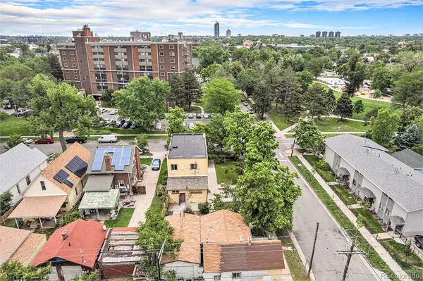 an aerial view of a city with lots of residential buildings