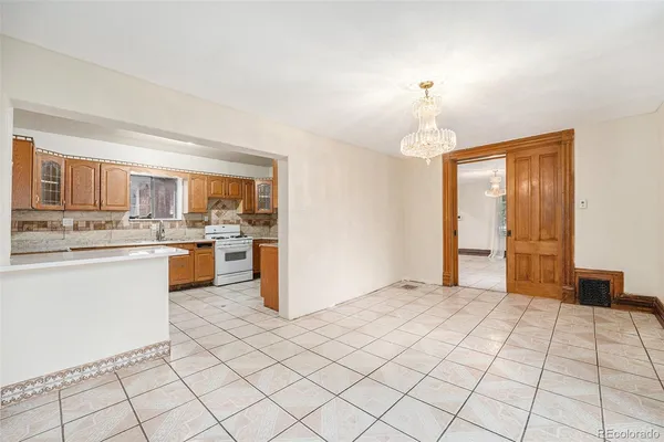a open kitchen with a sink cabinets and window