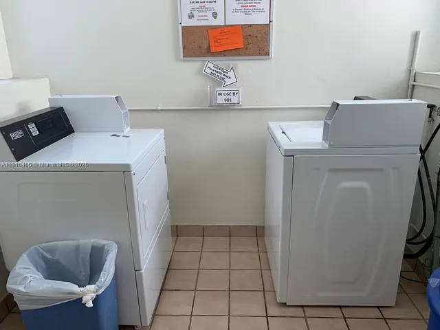 a view of a swimming pool with a yard