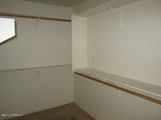 403 West Harwell Road Phoenix, AZ 85041 - Photo 31 of 39 Master bedroom walk in closet