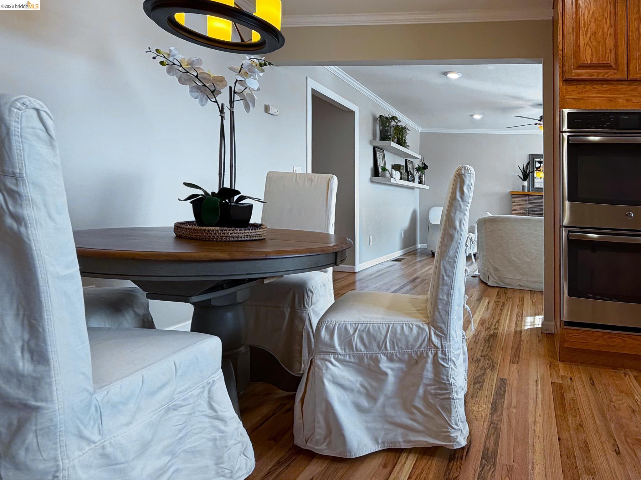 1732 Fernando Street Seaside, CA 93955 - Photo 15 of 53 Dining space featuring light wood finished floors and ornamental molding