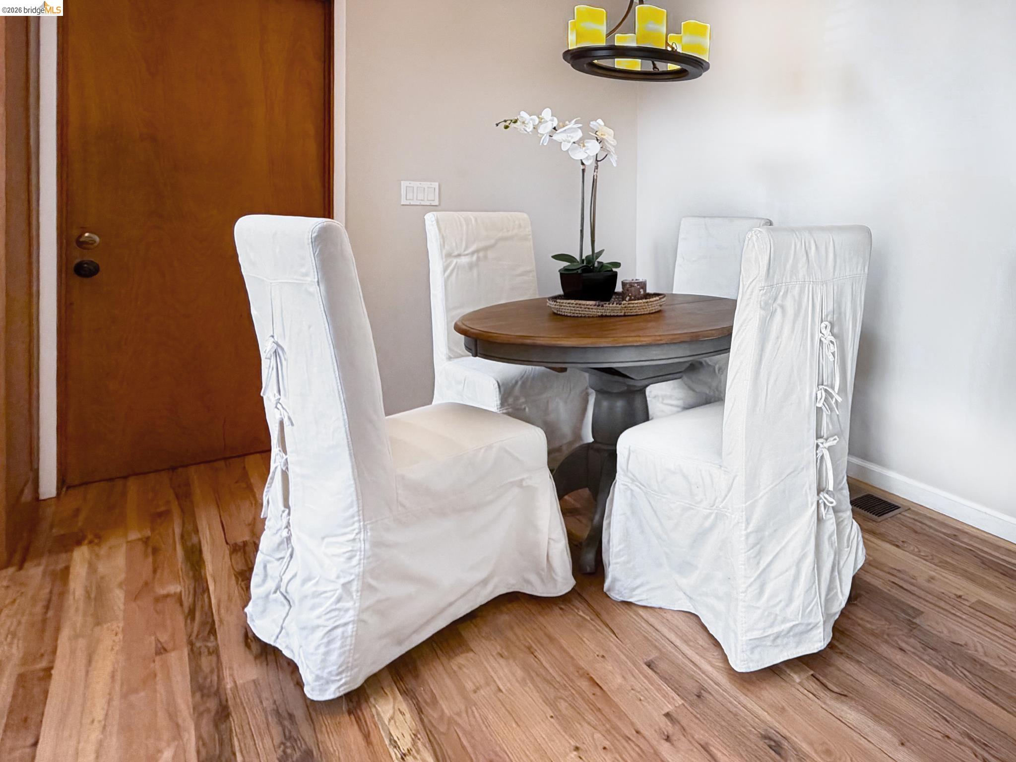 1732 Fernando Street Seaside, CA 93955 - Photo 19 of 53 Dining room with a chandelier and light wood finished floors