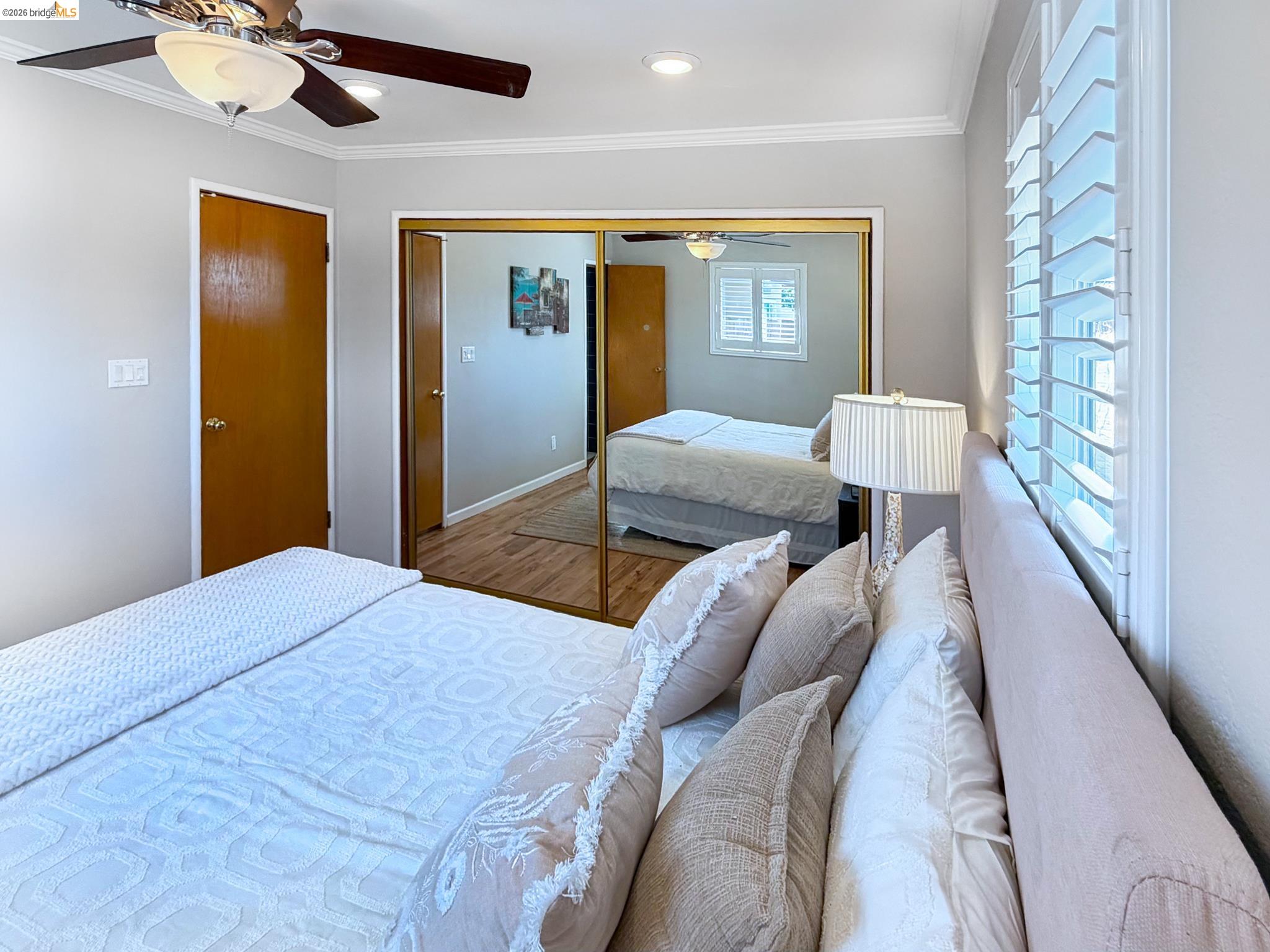 1732 Fernando Street Seaside, CA 93955 - Photo 29 of 53 Bedroom featuring ornamental molding, a ceiling fan, wood finished floors, a closet, and recessed lighting