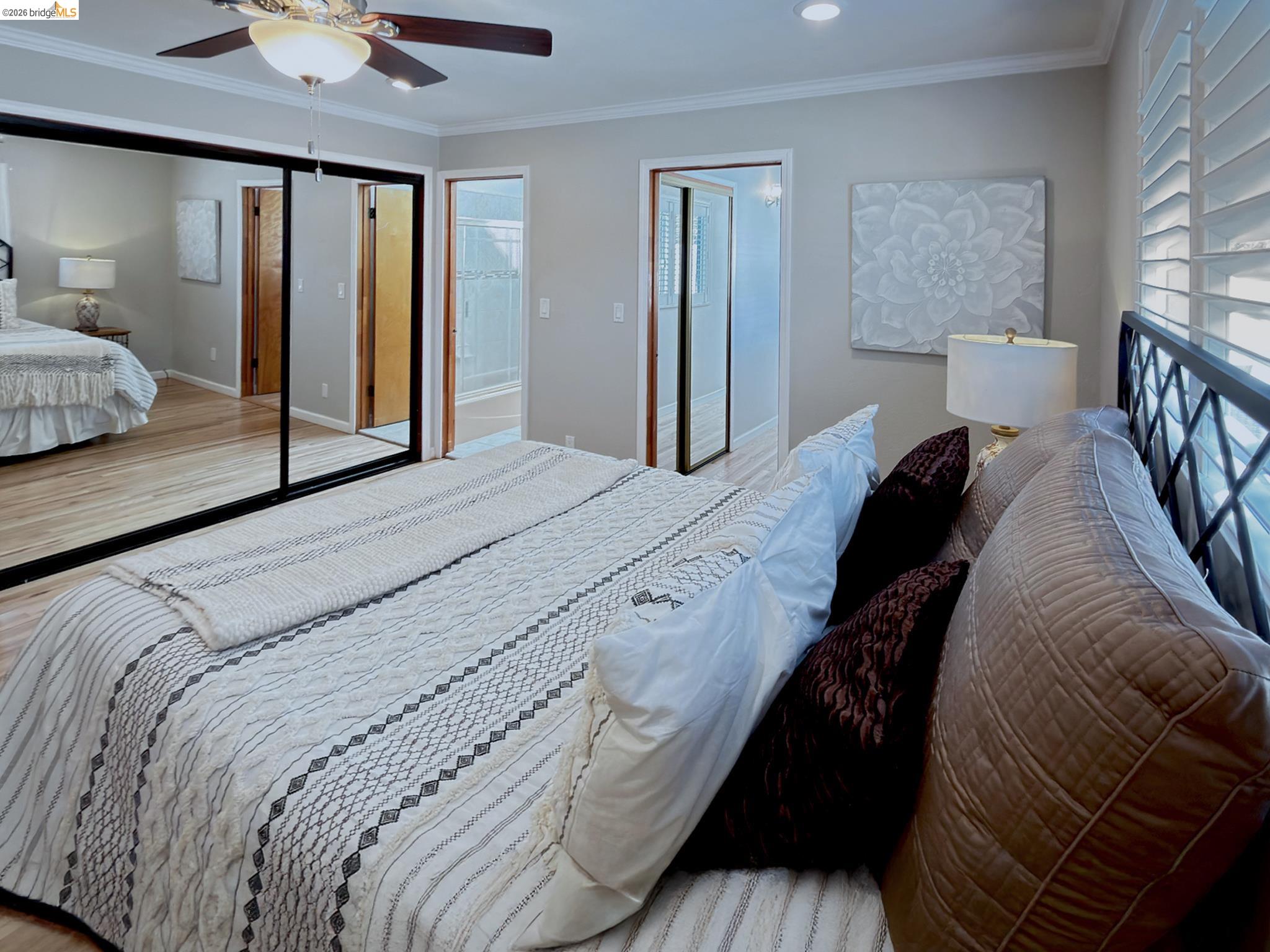 1732 Fernando Street Seaside, CA 93955 - Photo 33 of 53 Bedroom with light wood-type flooring, crown molding, ceiling fan, and a closet
