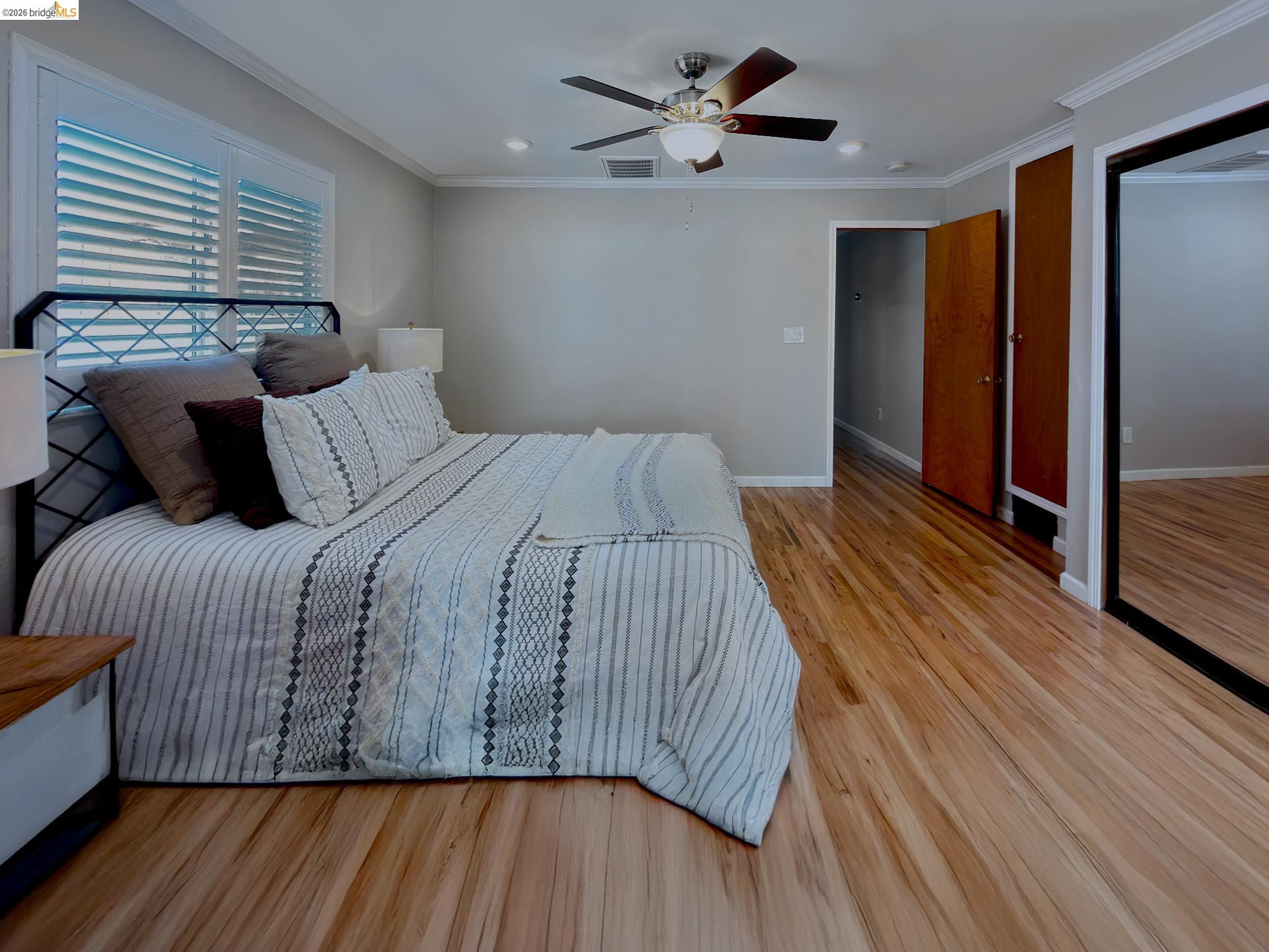 1732 Fernando Street Seaside, CA 93955 - Photo 34 of 53 Bedroom with light wood-style floors, ornamental molding, a ceiling fan, a closet, and recessed lighting