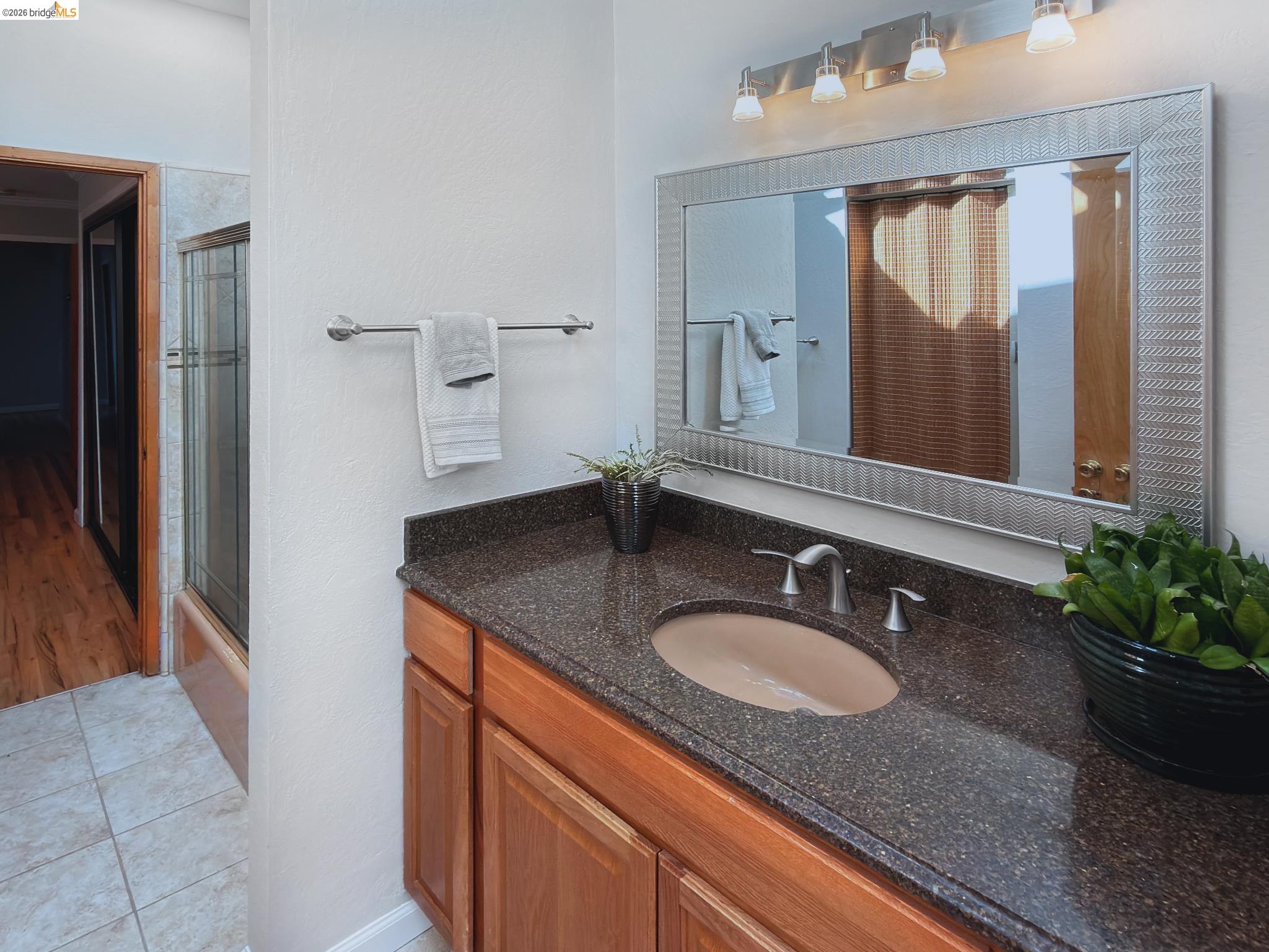 1732 Fernando Street Seaside, CA 93955 - Photo 44 of 53 Bathroom with vanity, shower / bath combination with glass door, and light tile patterned flooring