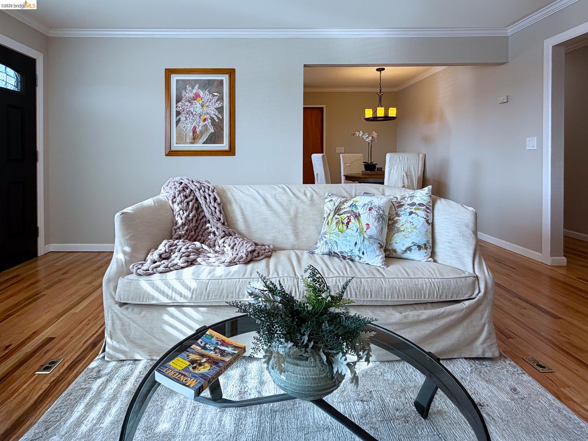1732 Fernando Street Seaside, CA 93955 - Photo 9 of 53 Living area with ornamental molding and light wood-style floors
