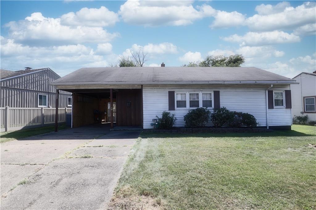 1340 Barkley Road McKeesport, PA 15133 - Photo 1 of 20 a view of a house with backyard and garden