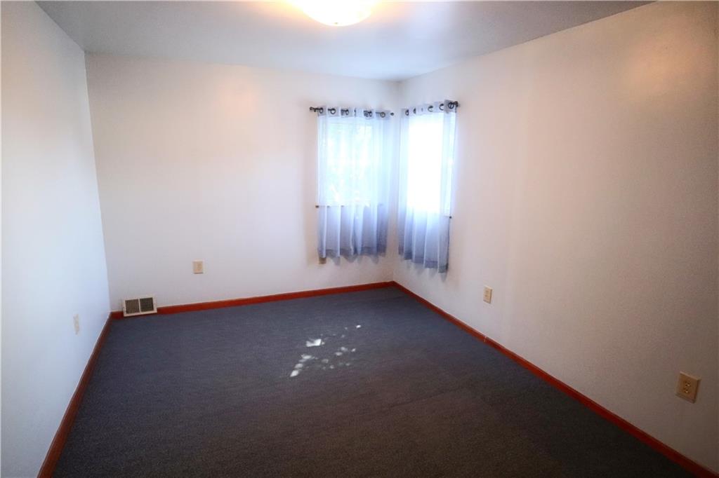 1340 Barkley Road McKeesport, PA 15133 - Photo 13 of 20 an empty room with a empty space and window