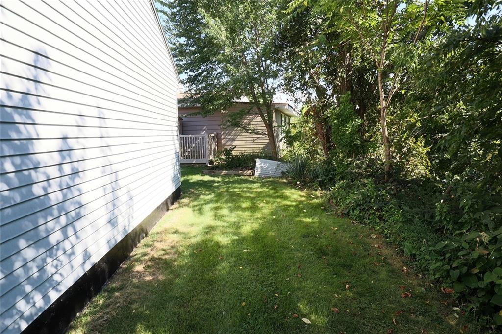 1340 Barkley Road McKeesport, PA 15133 - Photo 18 of 20 a large yard with lots of tress in front of it