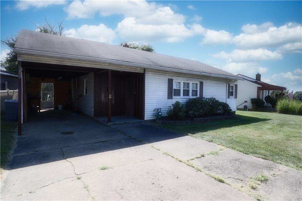 1340 Barkley Road McKeesport, PA 15133 - Photo 2 of 20 a view of backyard with potted plants and a table