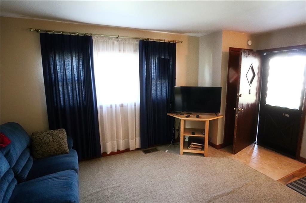 1340 Barkley Road McKeesport, PA 15133 - Photo 9 of 20 a view of a livingroom with furniture and an empty room