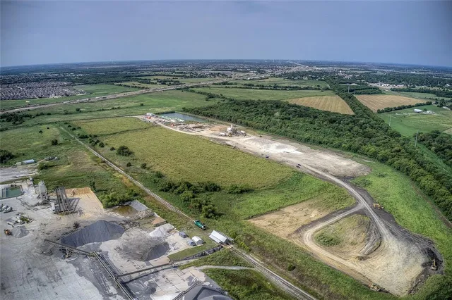 an aerial view of a golf course with a yard