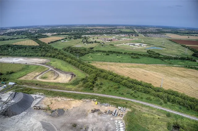 a view of a lake with a city
