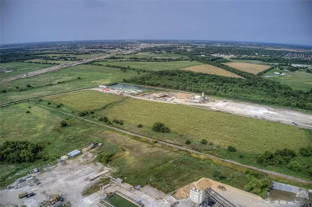a view of a city with an ocean