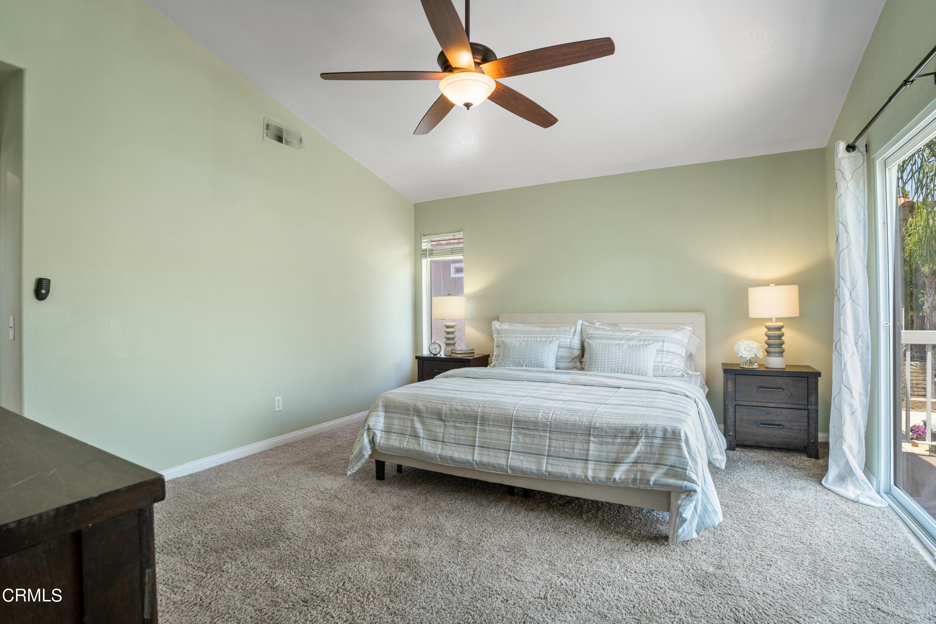 15737 Milne Circle Moorpark, CA 93021 - Photo 16 of 38 a bedroom with a bed and a ceiling fan