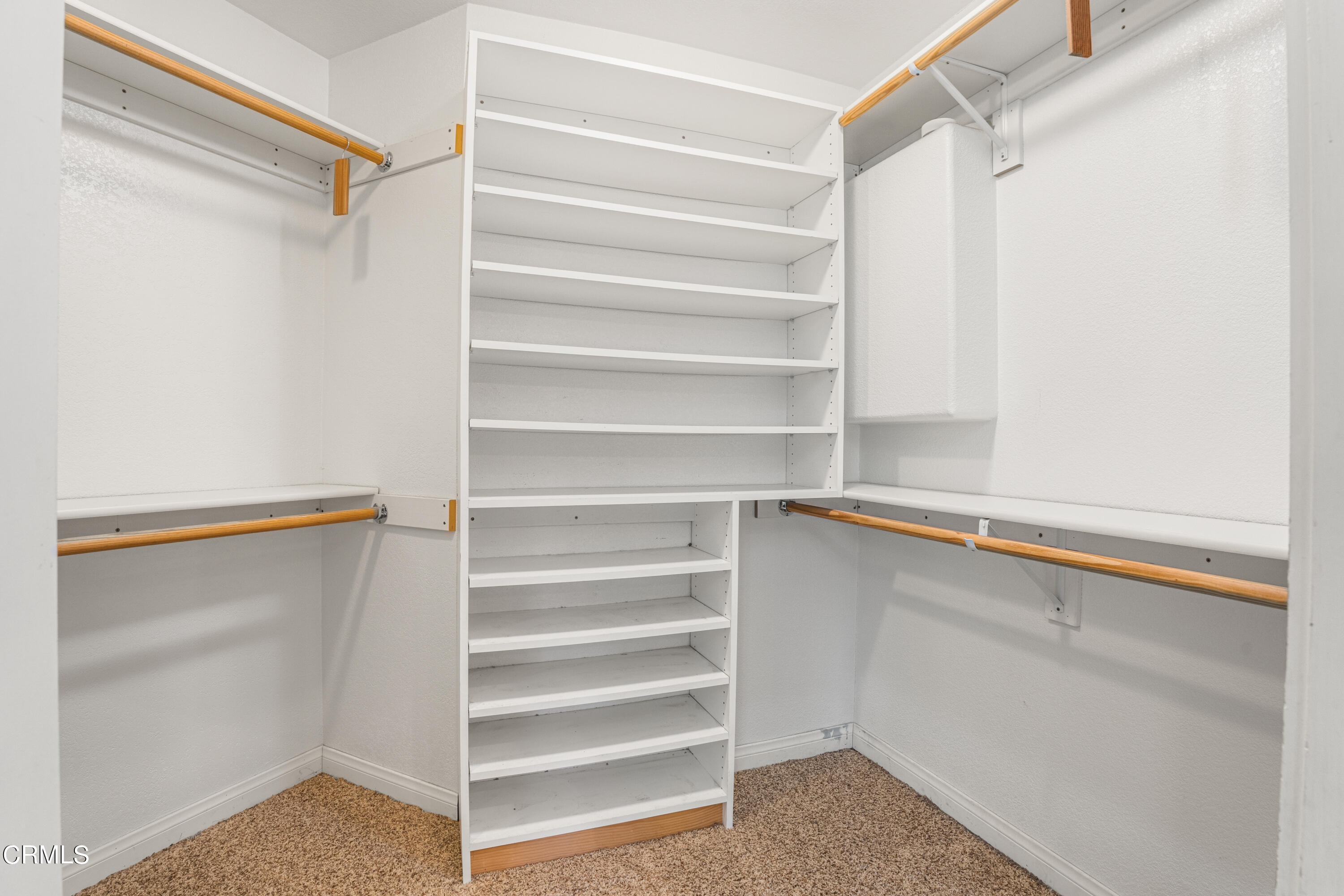 15737 Milne Circle Moorpark, CA 93021 - Photo 20 of 38 a view of walk in closet with empty racks