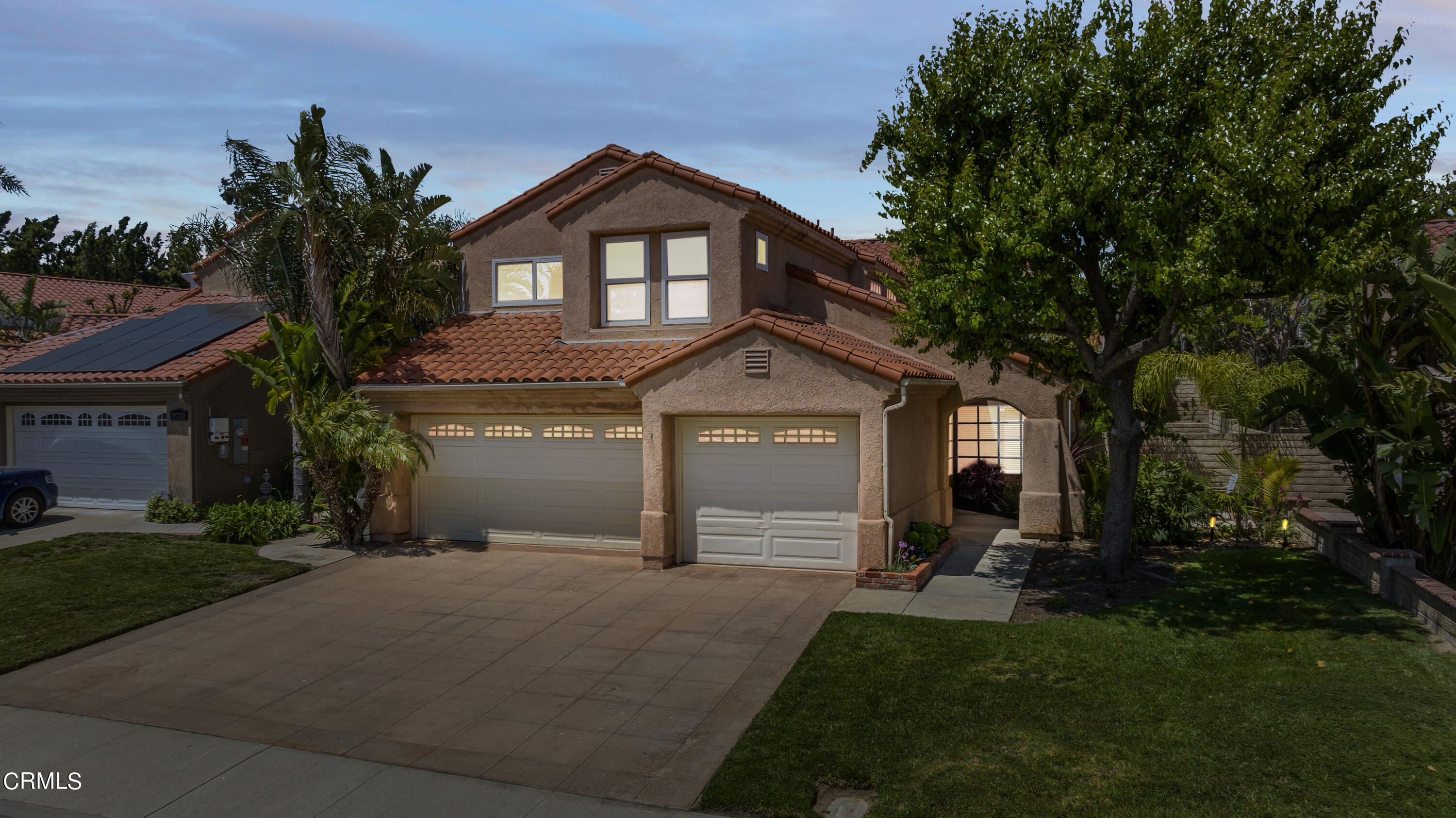 15737 Milne Circle Moorpark, CA 93021 - Photo 2 of 38 a front view of a house with a yard
