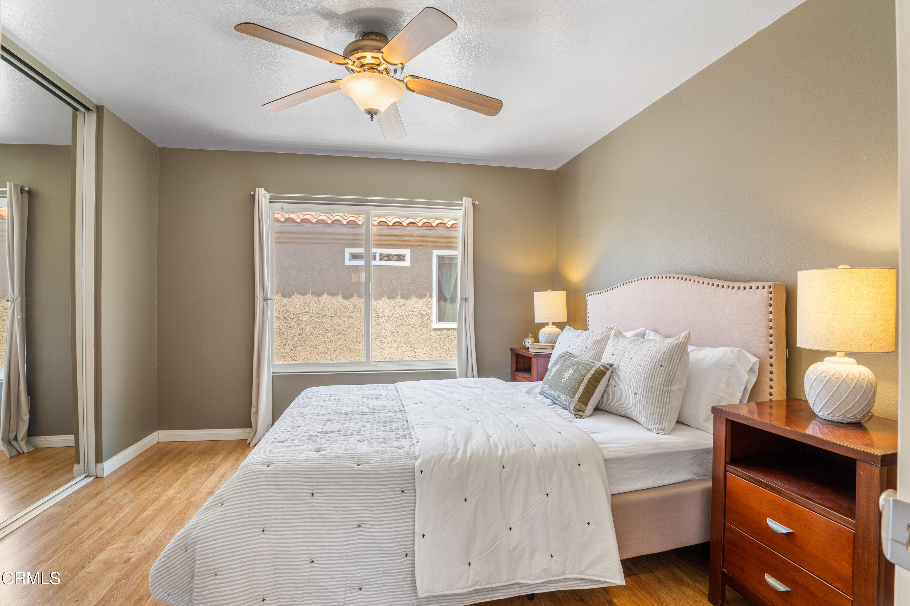 15737 Milne Circle Moorpark, CA 93021 - Photo 24 of 38 a bedroom with a bed and a window