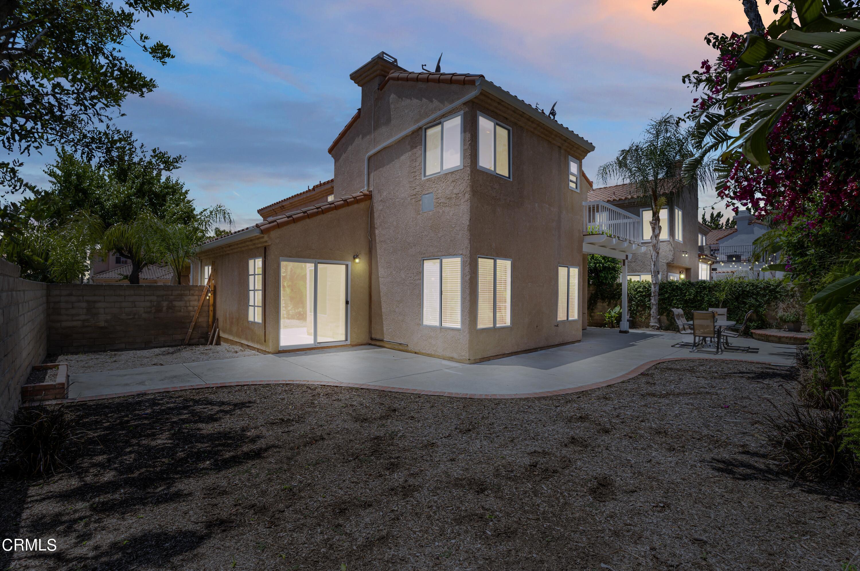 15737 Milne Circle Moorpark, CA 93021 - Photo 33 of 38 a front view of a house with a yard