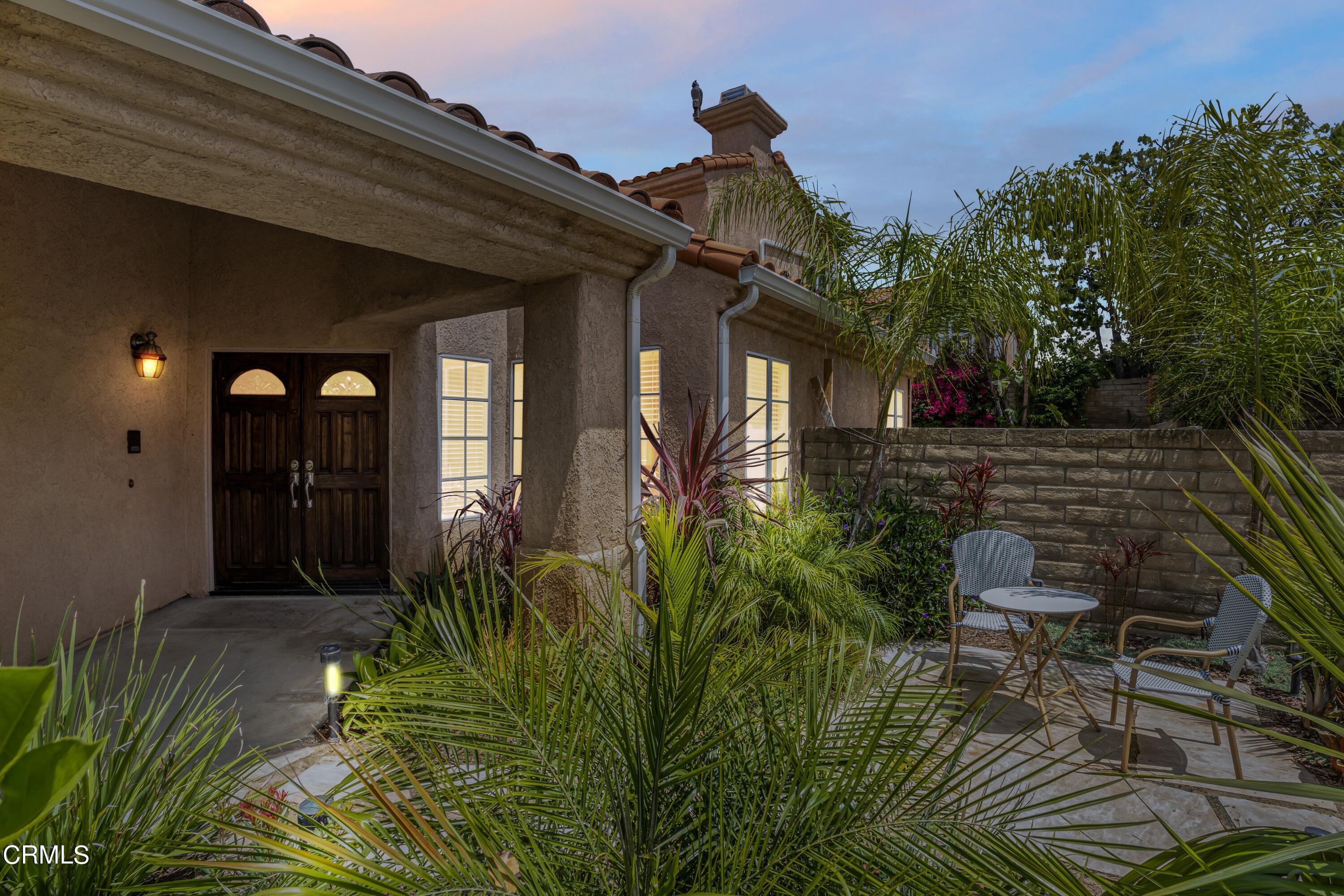 15737 Milne Circle Moorpark, CA 93021 - Photo 4 of 38 a front view of a house with a yard