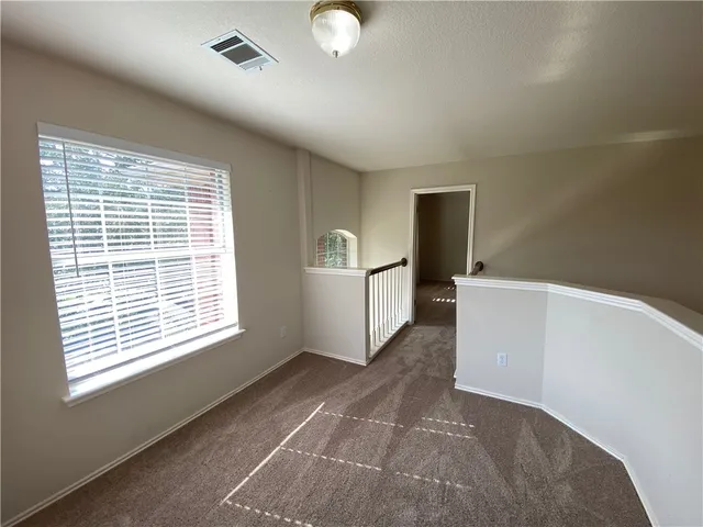 a view of a livingroom with a staircase