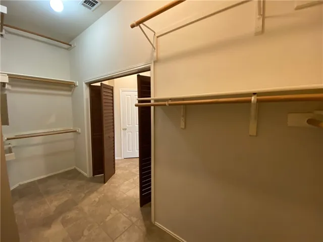 a view of a storage & utility room with washer and dryer
