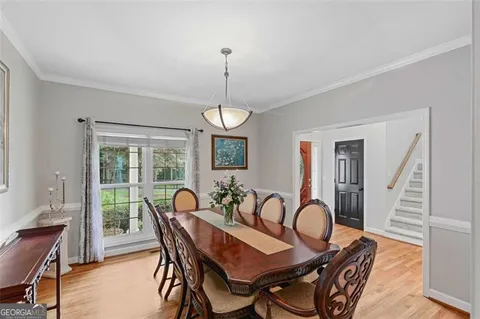 a spacious bathroom with a double vanity sink and a mirror