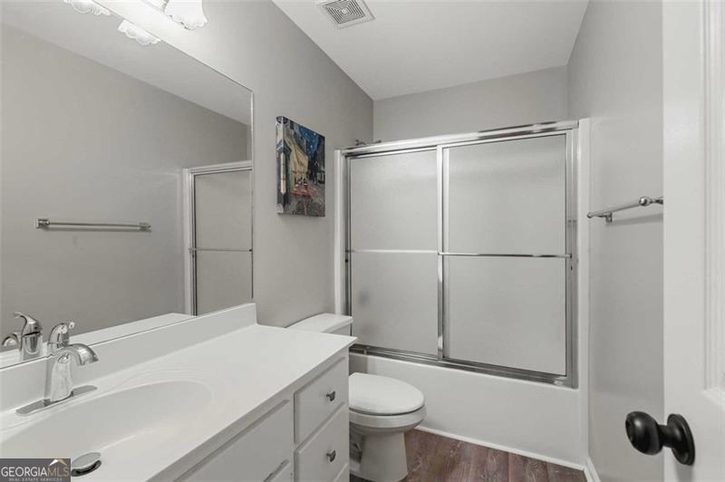 2203 Arbor Hill Road Canton, GA 30115 - Photo 46 of 64 a bathroom with a sink toilet and shower