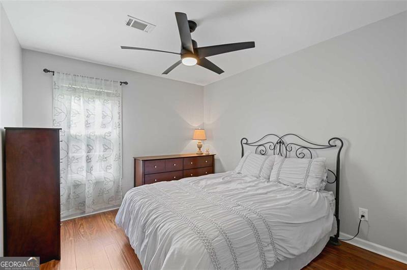 2203 Arbor Hill Road Canton, GA 30115 - Photo 48 of 64 a bedroom with a bed and a closet