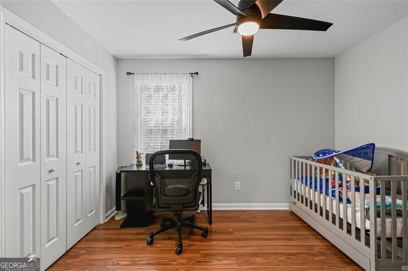 2203 Arbor Hill Road Canton, GA 30115 - Photo 49 of 64 a bedroom with furniture and windows
