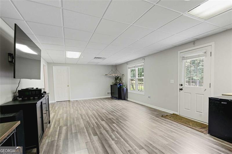 2203 Arbor Hill Road Canton, GA 30115 - Photo 51 of 64 a view of a room with wooden floor