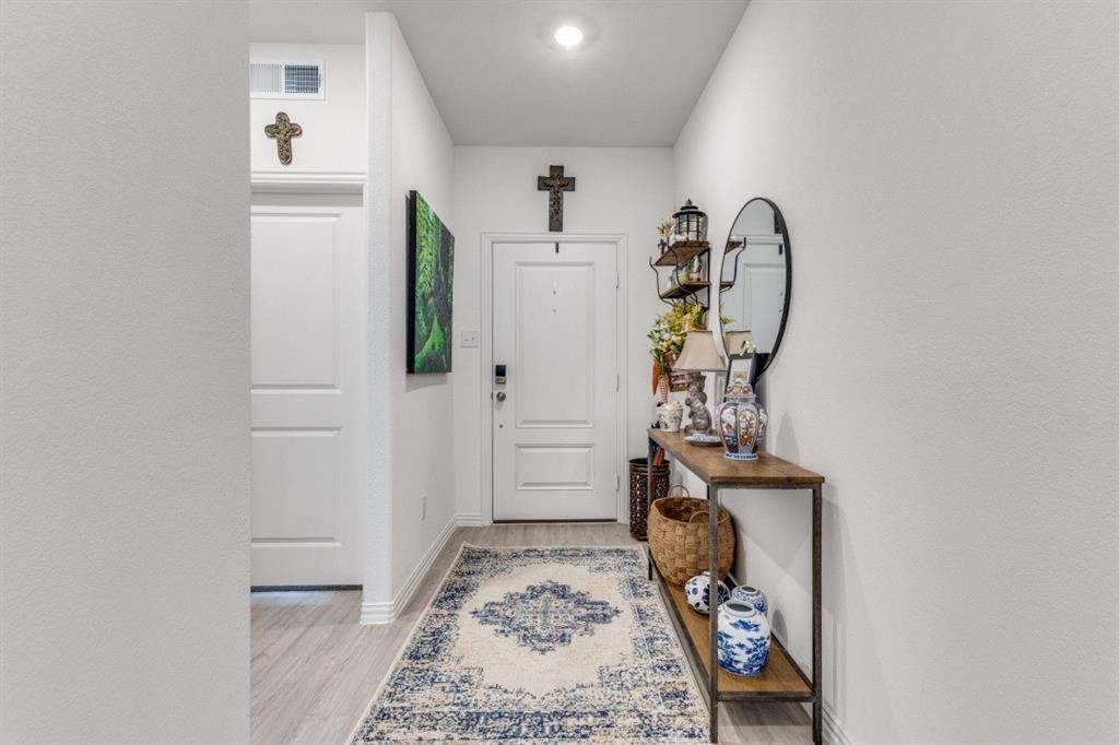 1213 Dragon Street Azle, TX 76020 - Photo 11 of 27 a view of a hallway with entryway