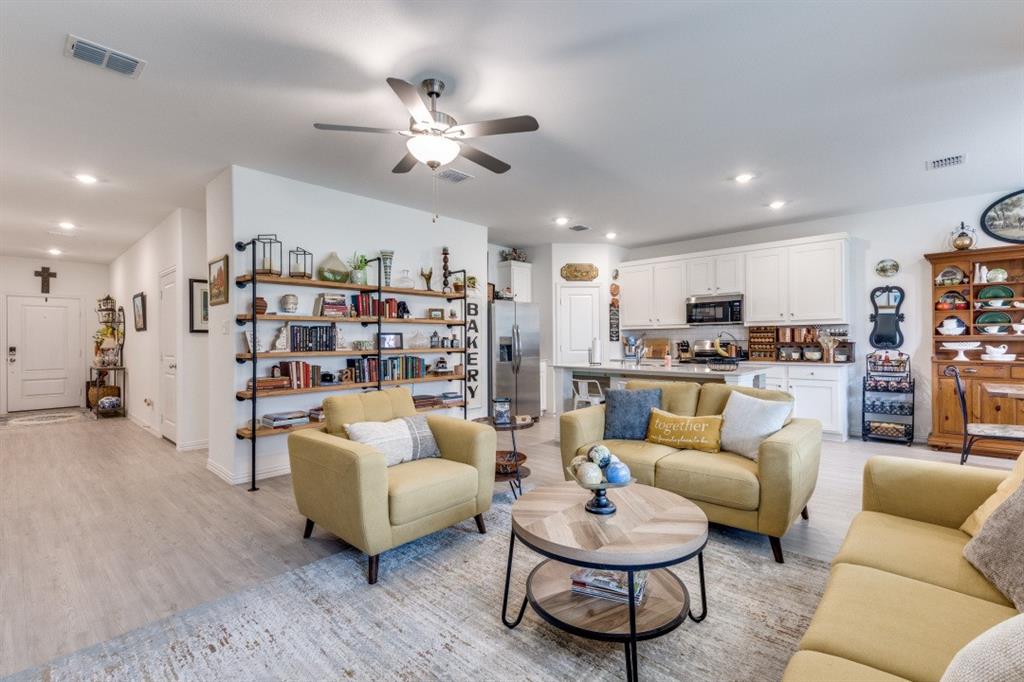 1213 Dragon Street Azle, TX 76020 - Photo 12 of 27 a living room with furniture and kitchen view