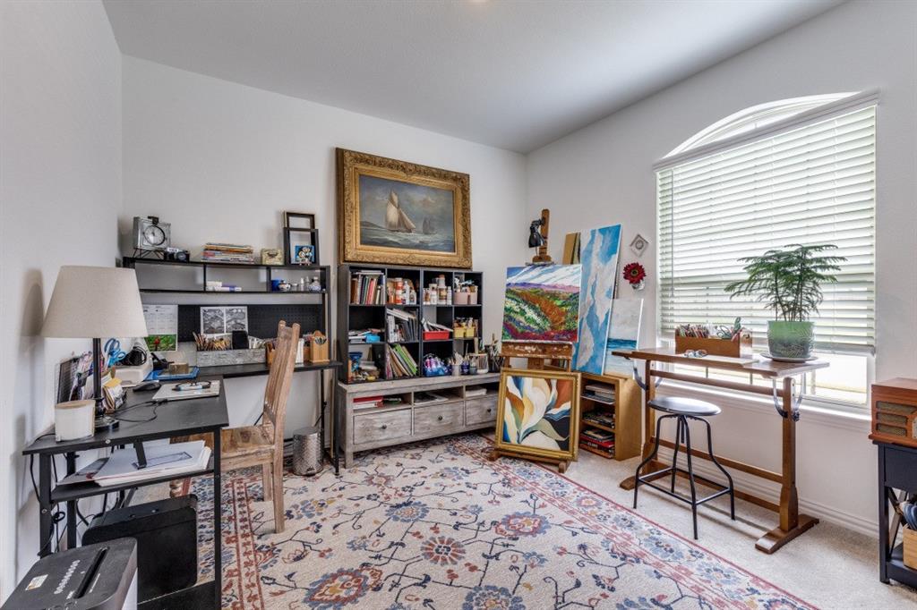 1213 Dragon Street Azle, TX 76020 - Photo 21 of 27 a view of a workspace with furniture and a window