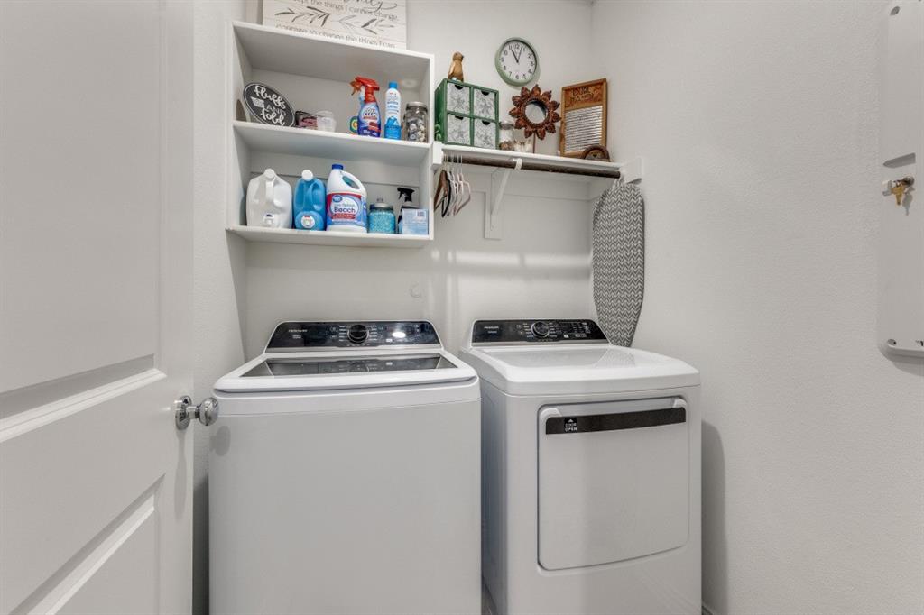 1213 Dragon Street Azle, TX 76020 - Photo 27 of 27 a utility room with dryer and washer