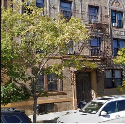 a car parked in front of a building
