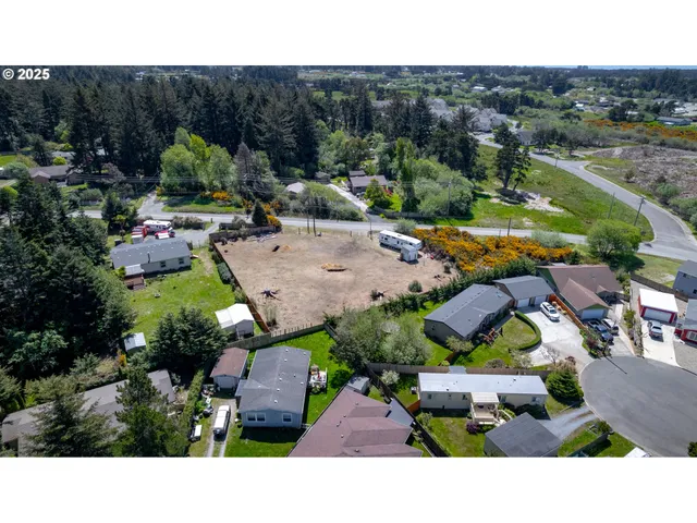 a aerial view of a house with a garden