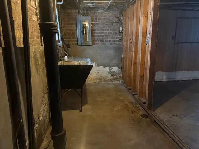a bathroom with a sink and mirror