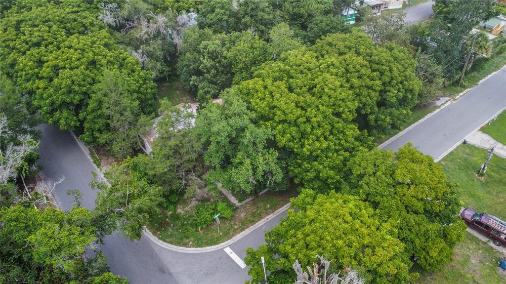 55 West Haven Road DeLand, FL 32720 - Photo 1 of 1 an aerial view of a house with a yard and outdoor seating