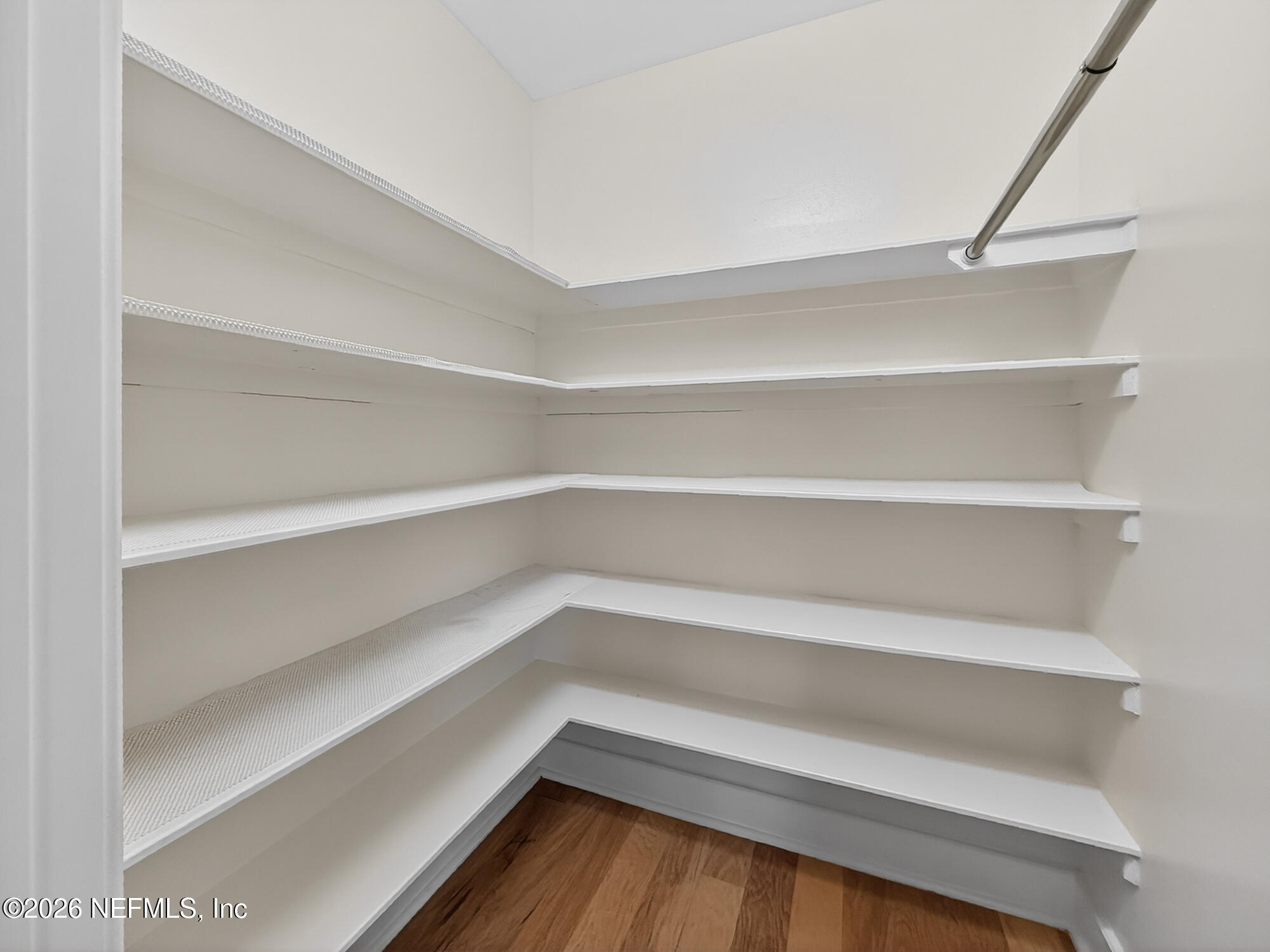 1661 Riverside Avenue, Unit 407 Jacksonville, FL 32204 - Photo 21 of 60 a view of walk in closet with empty racks