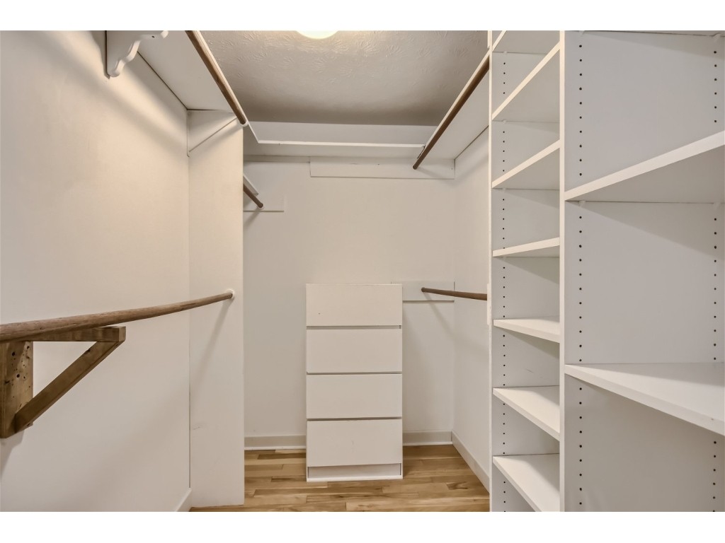 6824 Beckwith Road Mount Juliet, TN 37122 - Photo 13 of 36 a view of walk in closet with empty racks