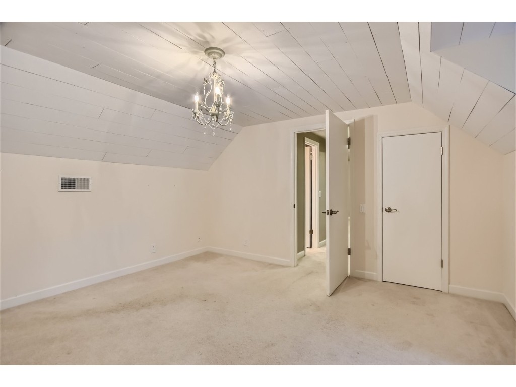 6824 Beckwith Road Mount Juliet, TN 37122 - Photo 17 of 36 a view of a livingroom with a chandelier