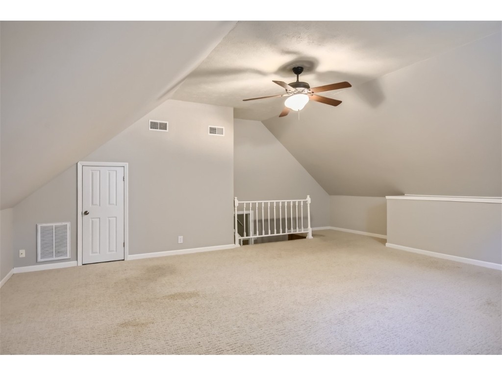 6824 Beckwith Road Mount Juliet, TN 37122 - Photo 20 of 36 a view of a livingroom with a ceiling fan and window